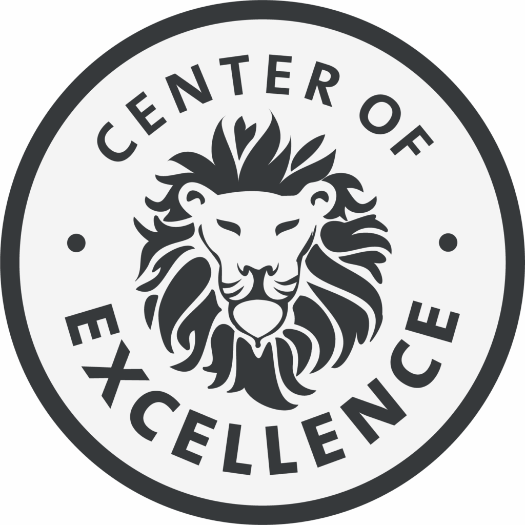 Center of Excellence Siegel mit Löwenkopf – Auszeichnung für höchste Qualitätsstandards und herausragende Fachkompetenz in der Zahnmedizin.